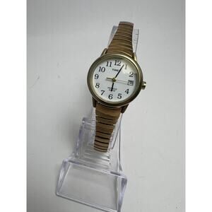 Timex ladies Indiglo gold tone calendar wristwatch